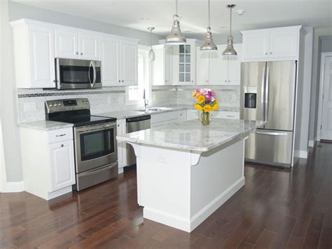 white cabinets with stainless appliances